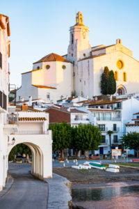 View of the village of Cadaques and the church of Santa Maria during the sunrise on the Costa Brava in the province of Girona in Catalonia Spain View of the village of Cadaques and the church of Santa Maria during the sunrise on the Costa Brava in the province of Girona in Catalonia Spain